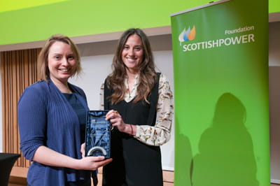 Clare Cogan Turner of SBH Scotland is presented with the education award from Elena Sanz of Scottish Power Foundationthe Scott