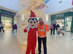 Eric the Christmas Elf poses with Russ of the Antonine Centre