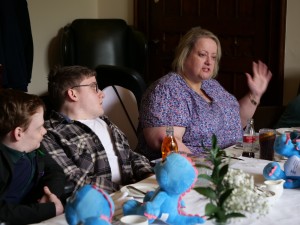 Mum, Anna, is captured speaking to a room of people