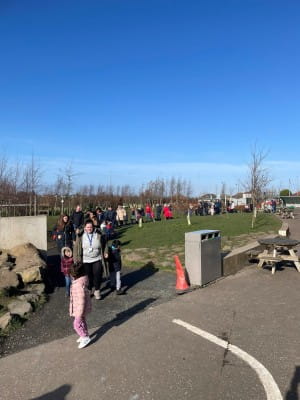 calderwood nursery children and staff walking in park for SBH Scotland