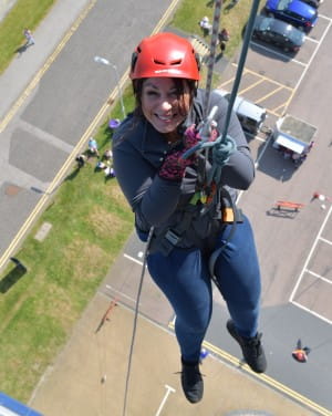 ABerdeen Abseiler smiling on way down Norther Lights Tower