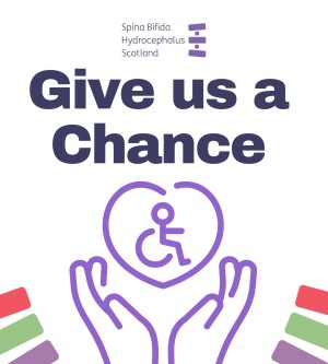 Hands holding disability sign in a heart. 