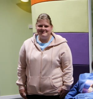 Kimberly is posing for a photo at one of SBH Scotland's groups