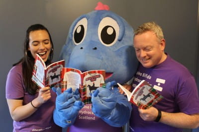 people reading Scottish Wit book