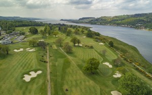 Looking west on the green Earl of Mar Golf Course with river running beside.