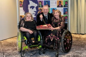 Andy Nicola, Chris Tait Burns reenactor, ella chambers pose with haggis at question of burns event