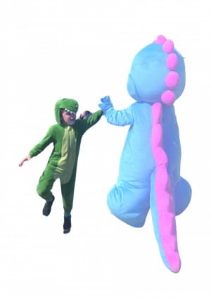 Spiney the Diney high fiving a boy dressed as a dinosaur