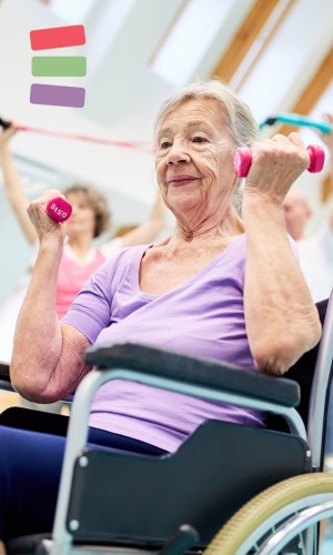 Lady in wheelchair, lifting weights