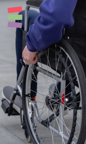 hand on corner of wheelchair