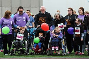 group of charity people coming together for charity walk